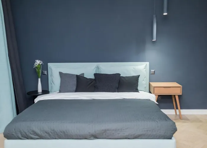 Explore The City From Its Center In A Chic Balcony Apartment