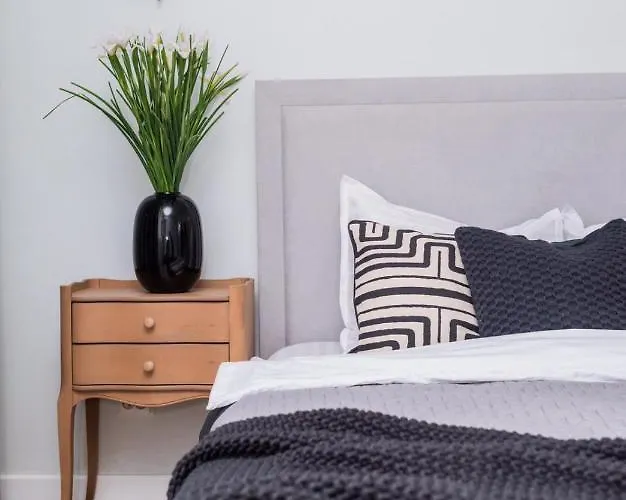 Explore The City From Its Center In A Chic Balcony Apartment